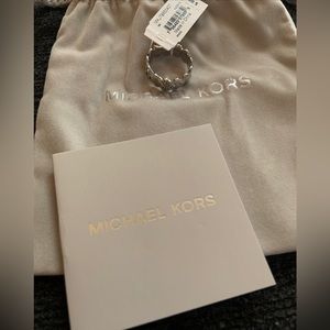 Michael kors ladies silver plated over brass heart, crystal logo ring Sz 7